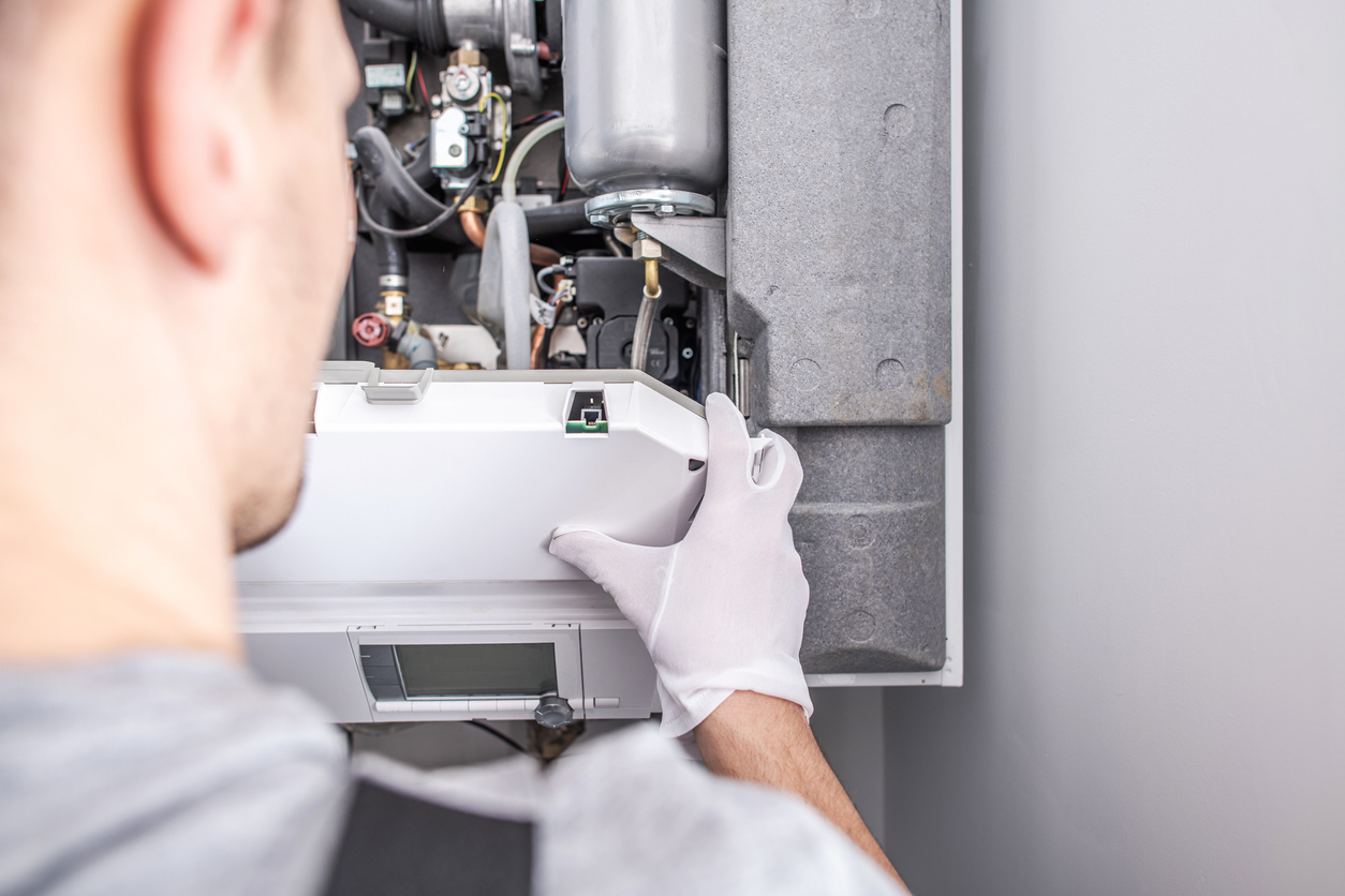 Technician working on a furnace